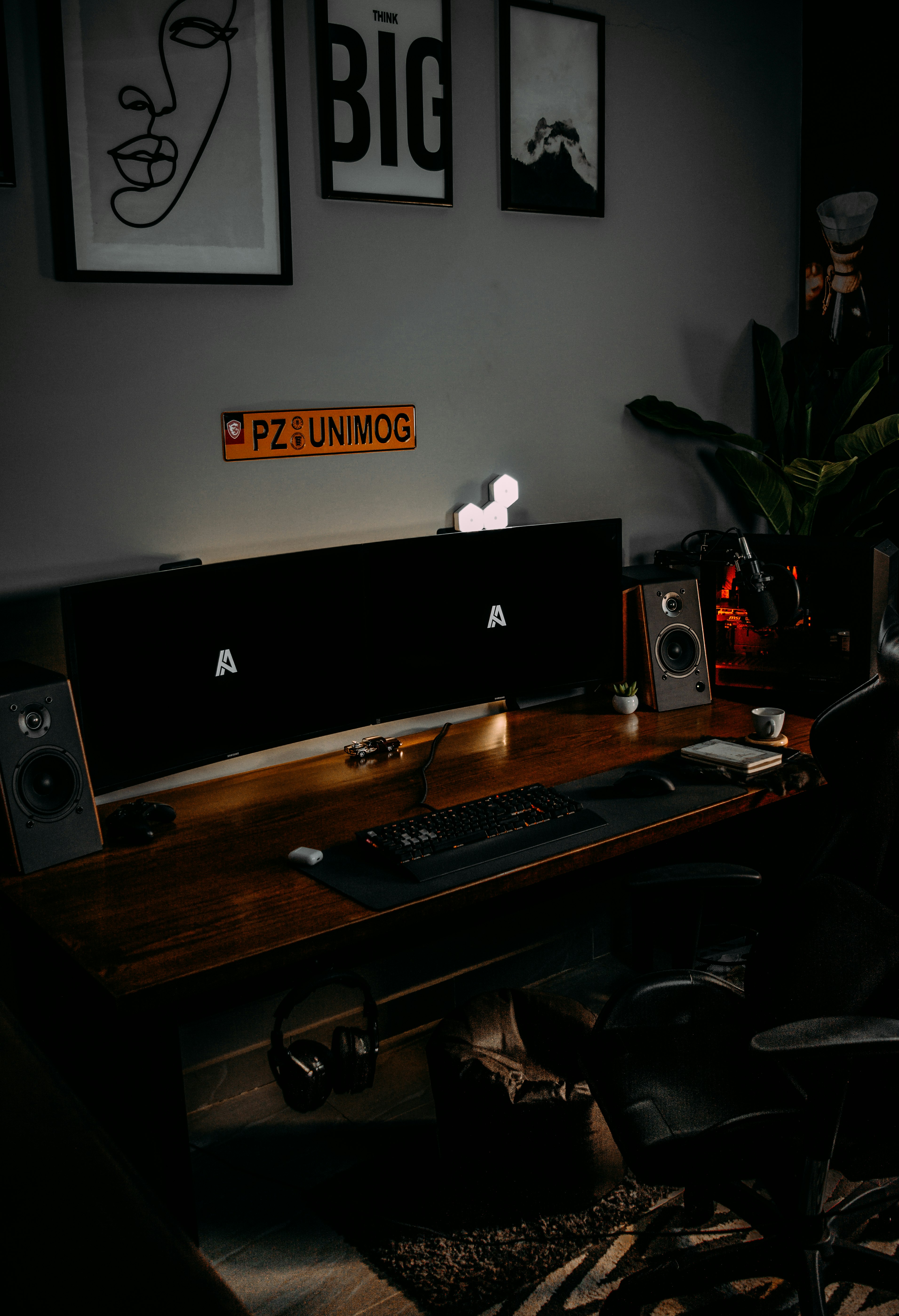 black flat screen tv on brown wooden table